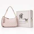 A light pink GG monogram shoulder bag with gold chain and strap details.